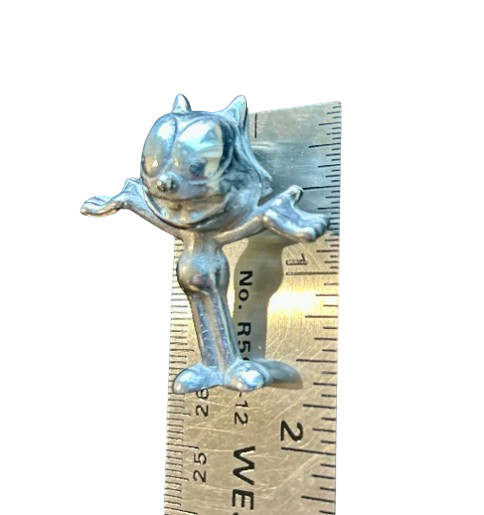 Silver Felix the cat pin badge